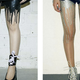 Illustration for article titled These $50 Tights Will Make It Look Like Glittery Wax Is Melting From Your Crotch